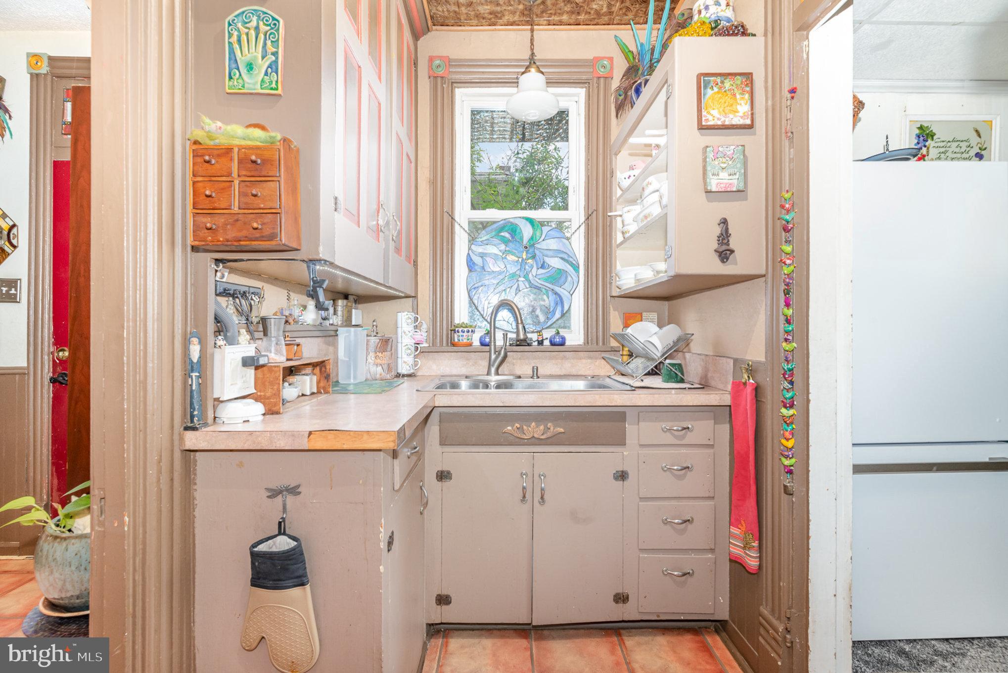 135 Lucknow Road Harrisburg, PA 17110 - Photo 11 of 27 a bathroom with a sink vanity and a mirror