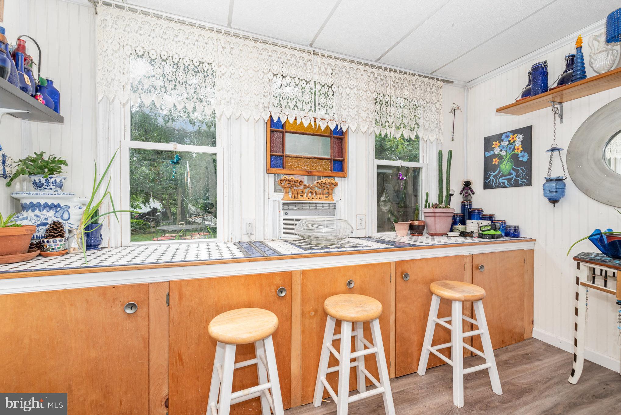 135 Lucknow Road Harrisburg, PA 17110 - Photo 12 of 27 a dining table chair next to a window