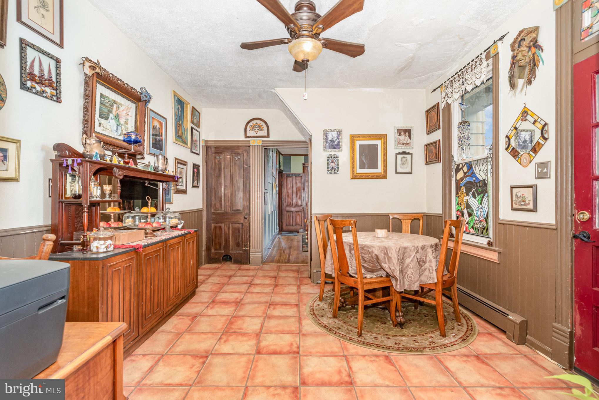 135 Lucknow Road Harrisburg, PA 17110 - Photo 9 of 27 a kitchen with stainless steel appliances kitchen island granite countertop furniture and a dining table