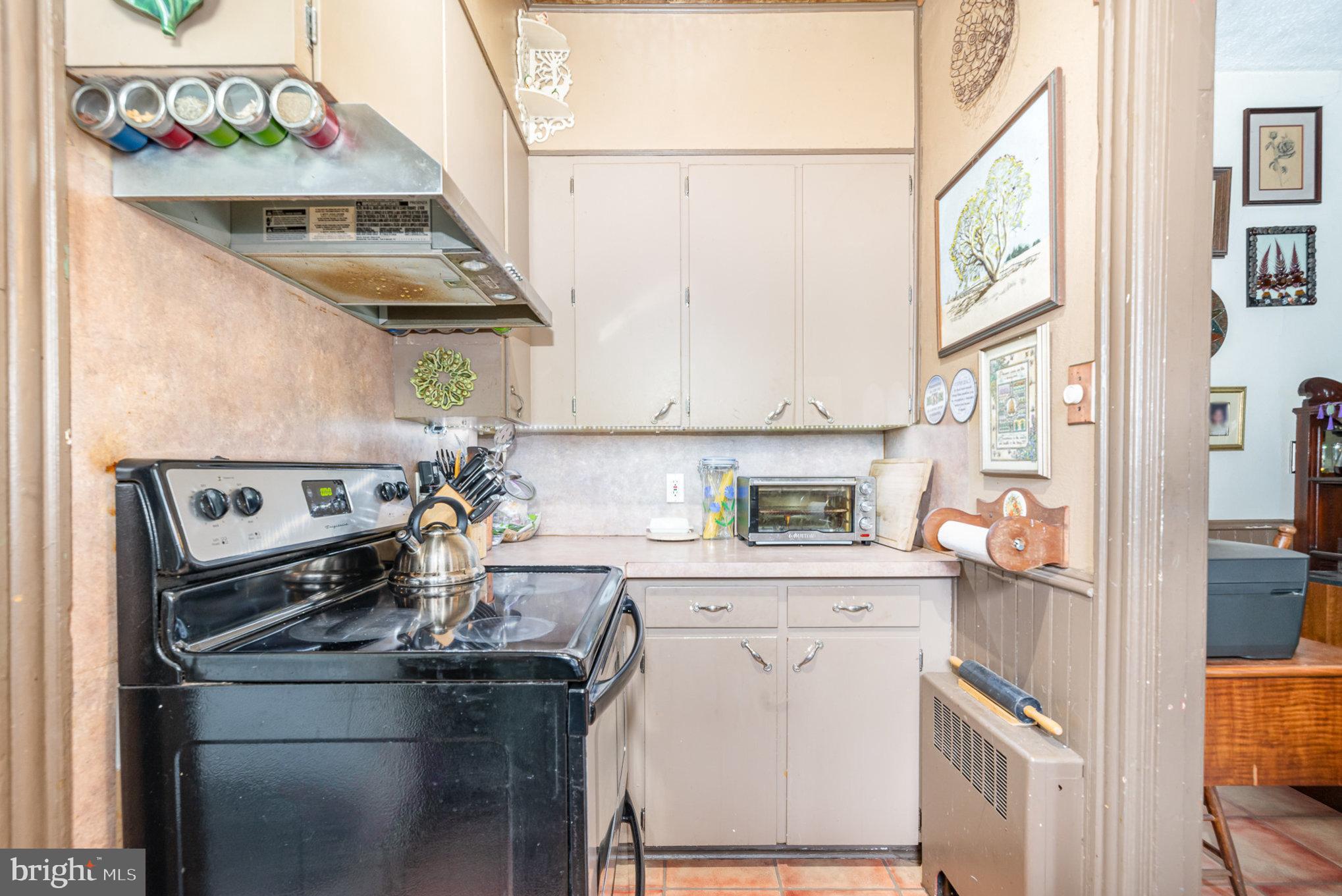 135 Lucknow Road Harrisburg, PA 17110 - Photo 10 of 27 a kitchen with stainless steel appliances granite countertop a stove and a refrigerator