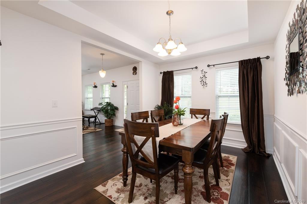 290 Fischer Road Fort Mill, SC 29715 - Photo 11 of 35 a view of a dining room with furniture window and wooden floor