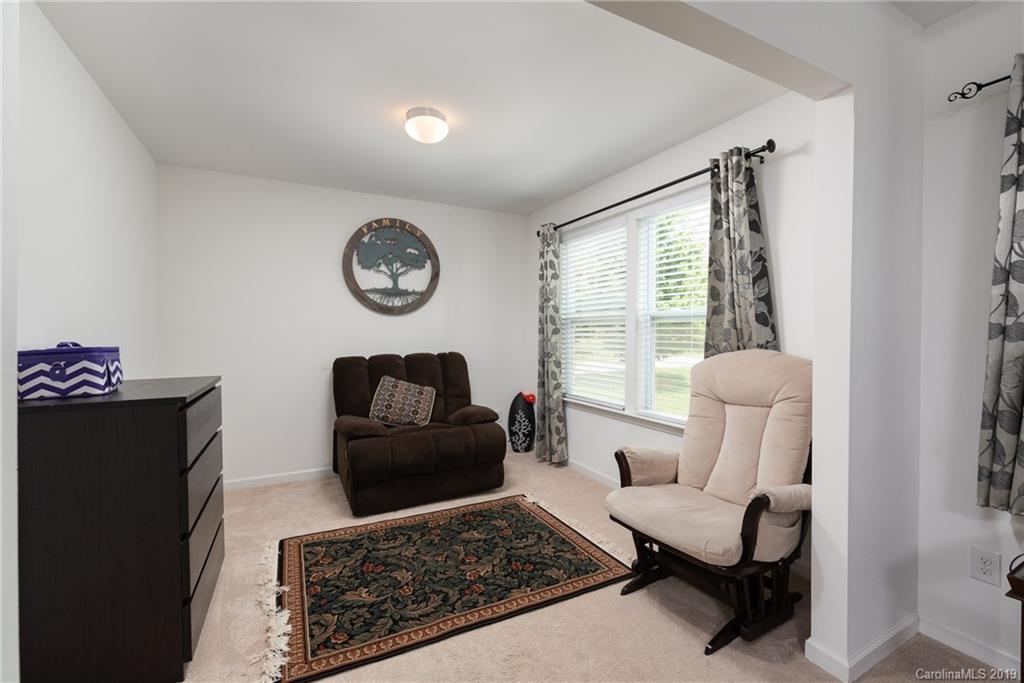 290 Fischer Road Fort Mill, SC 29715 - Photo 19 of 35 a living room with furniture and a window