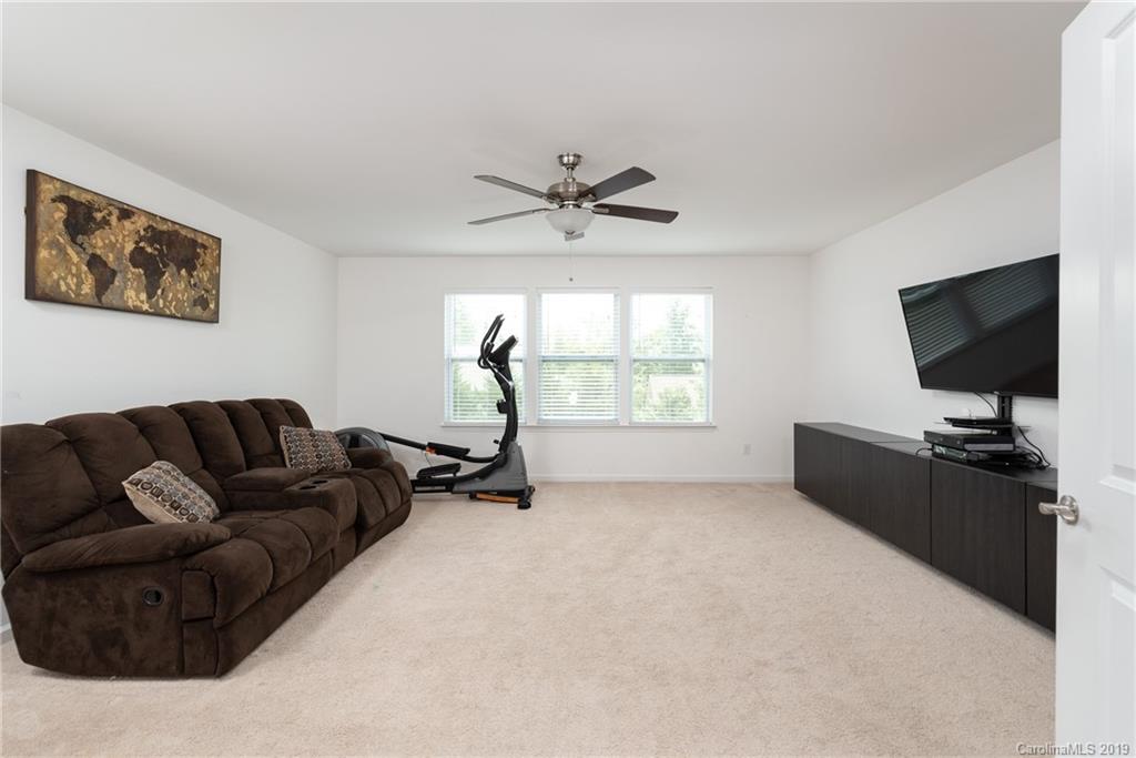 290 Fischer Road Fort Mill, SC 29715 - Photo 23 of 35 a living room with furniture and a flat screen tv