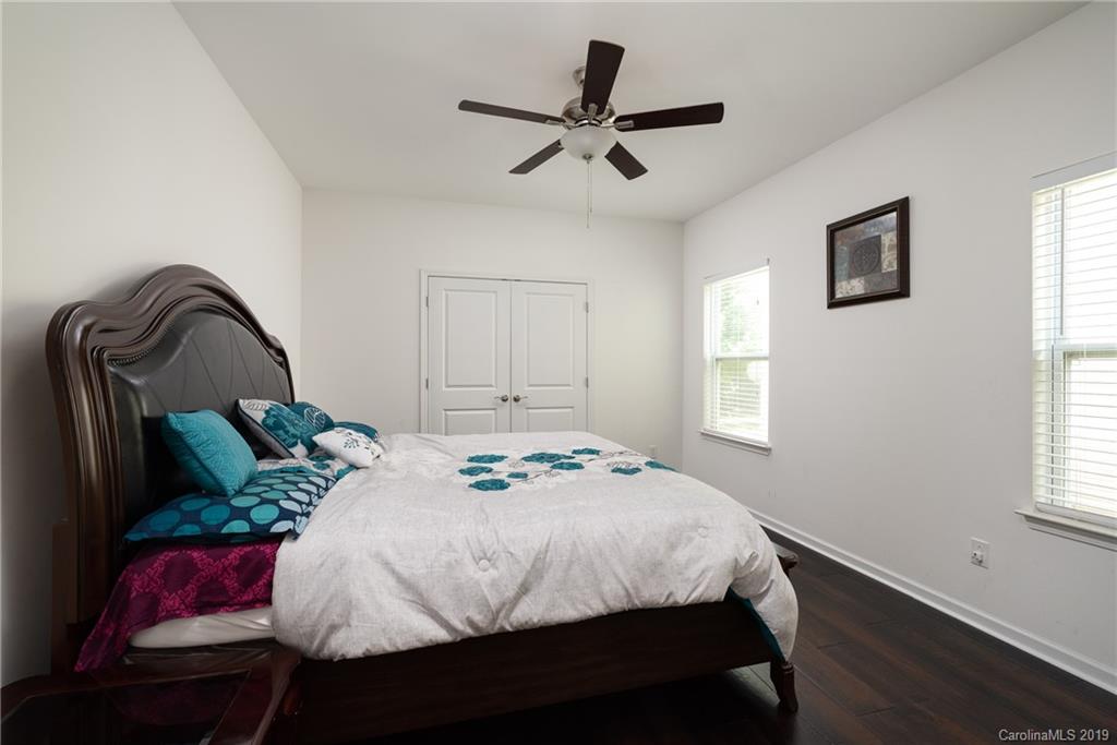 290 Fischer Road Fort Mill, SC 29715 - Photo 28 of 35 a bedroom that has a bed and a dresser in it