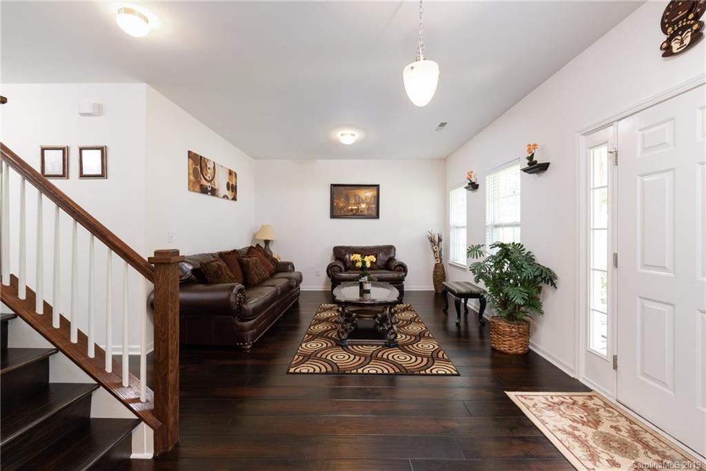 290 Fischer Road Fort Mill, SC 29715 - Photo 6 of 35 a living room with furniture flowerpot and wooden floor