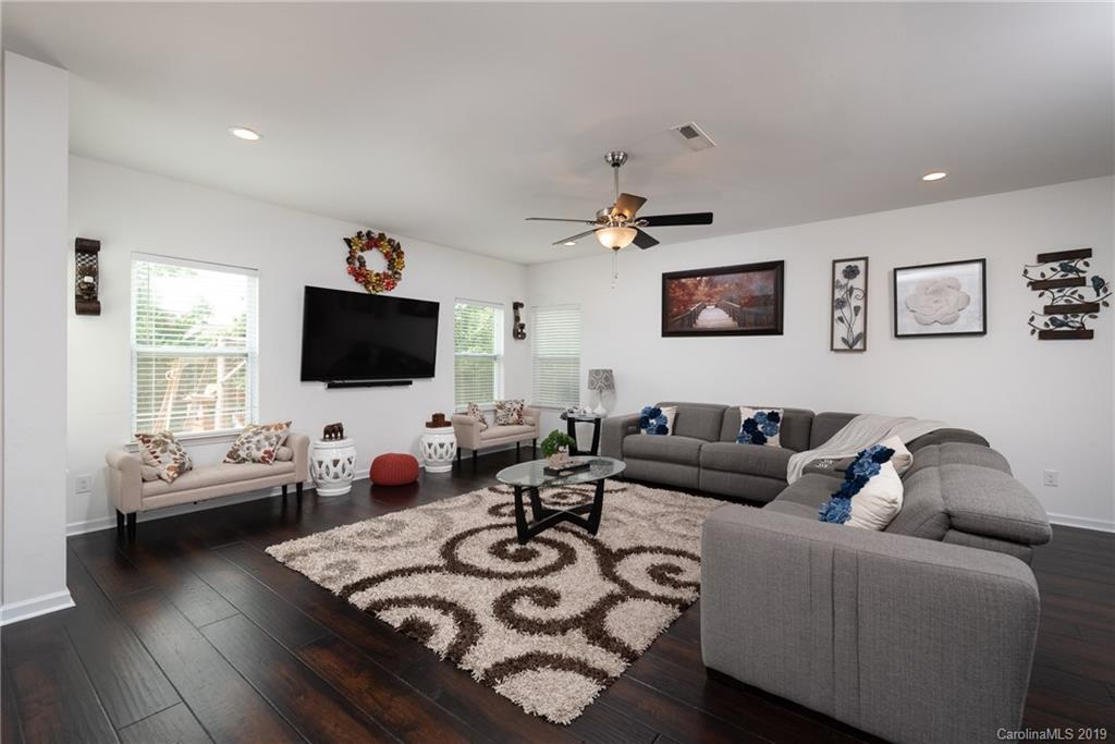 290 Fischer Road Fort Mill, SC 29715 - Photo 8 of 35 a living room with furniture and a flat screen tv