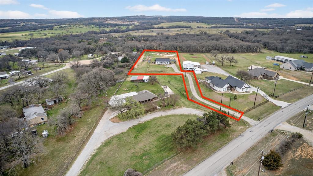 2225 West J E Woody Road Springtown, TX 76082 - Photo 8 of 29 an aerial view of a house