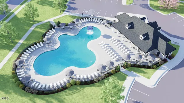 an aerial view of a swimming pool and outdoor space