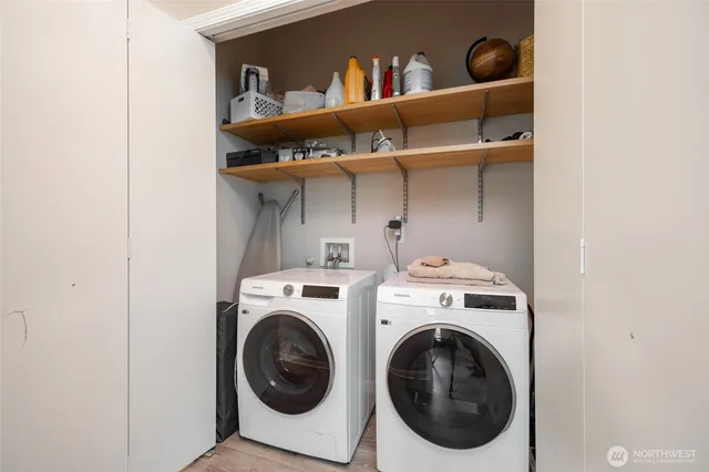 a utility room with dryer and washer