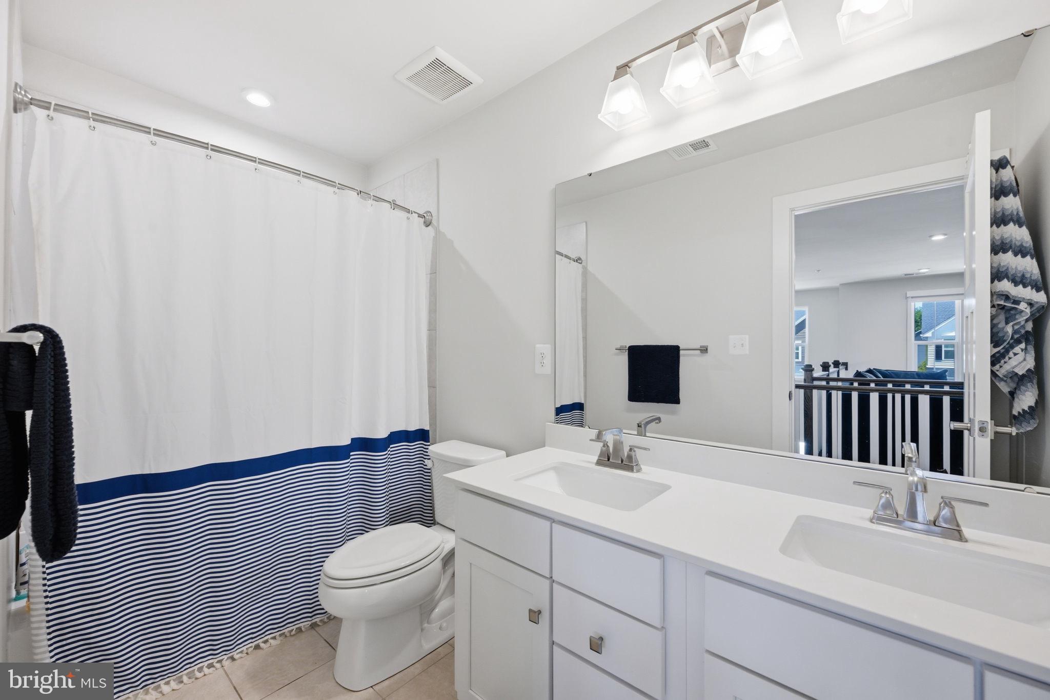 1321 Upper Patuxent Ridge Road Odenton, MD 21113 - Photo 40 of 48 Modern bathroom with coastal charm.