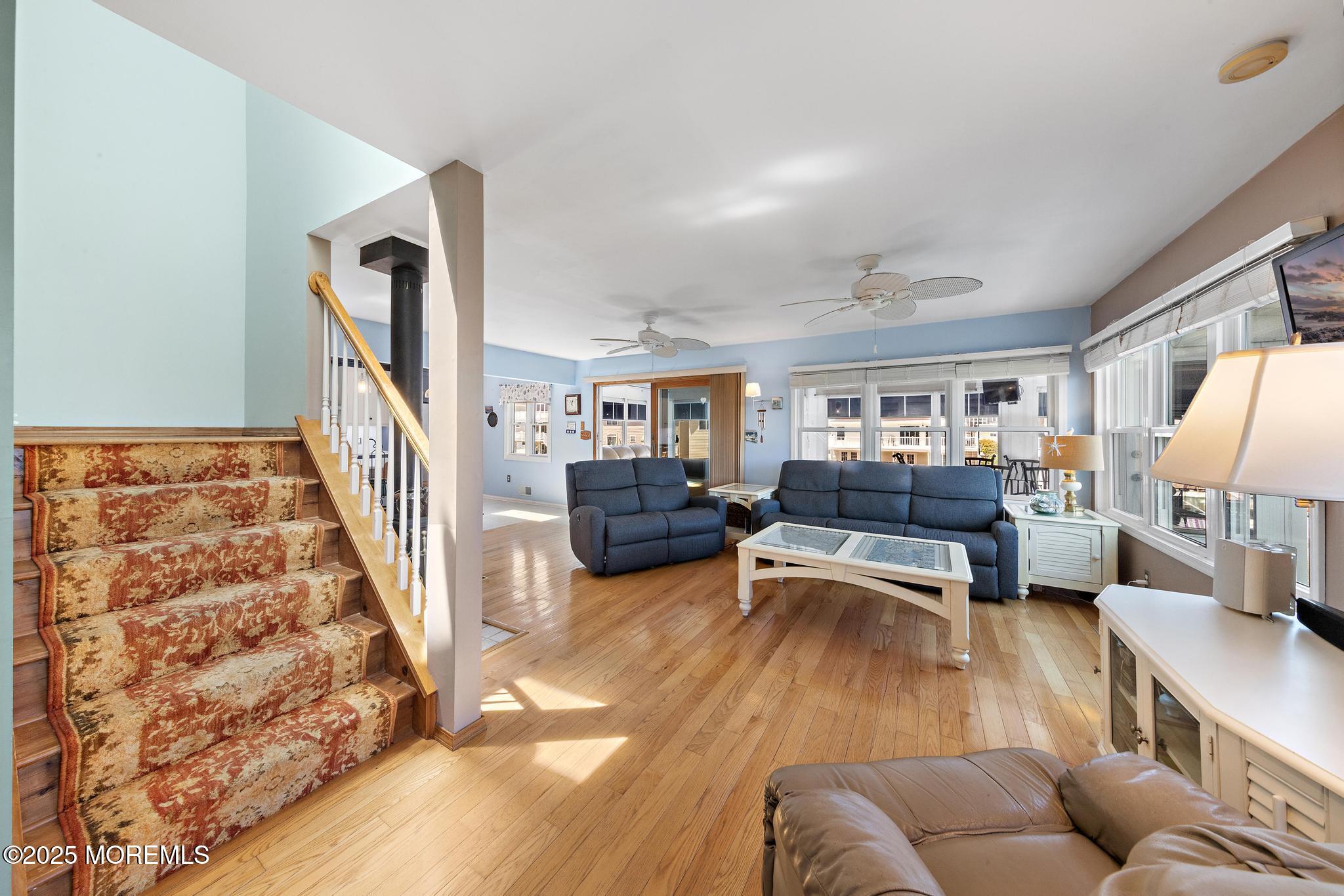 68 Patrick Drive Beach Haven West, NJ 08050 - Photo 2 of 16 a living room with furniture and a wooden floor