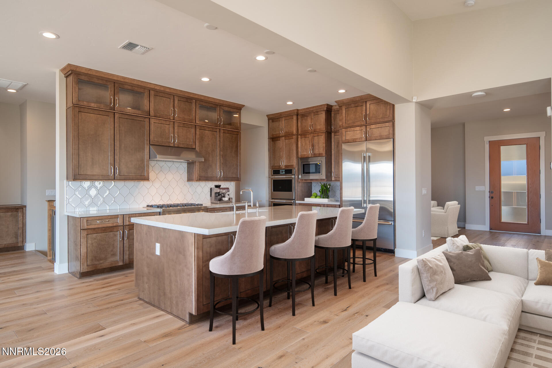 2241 Cold Creek Trail Reno, NV 89523 - Photo 11 of 40 a view of a dining room with furniture and wooden floor