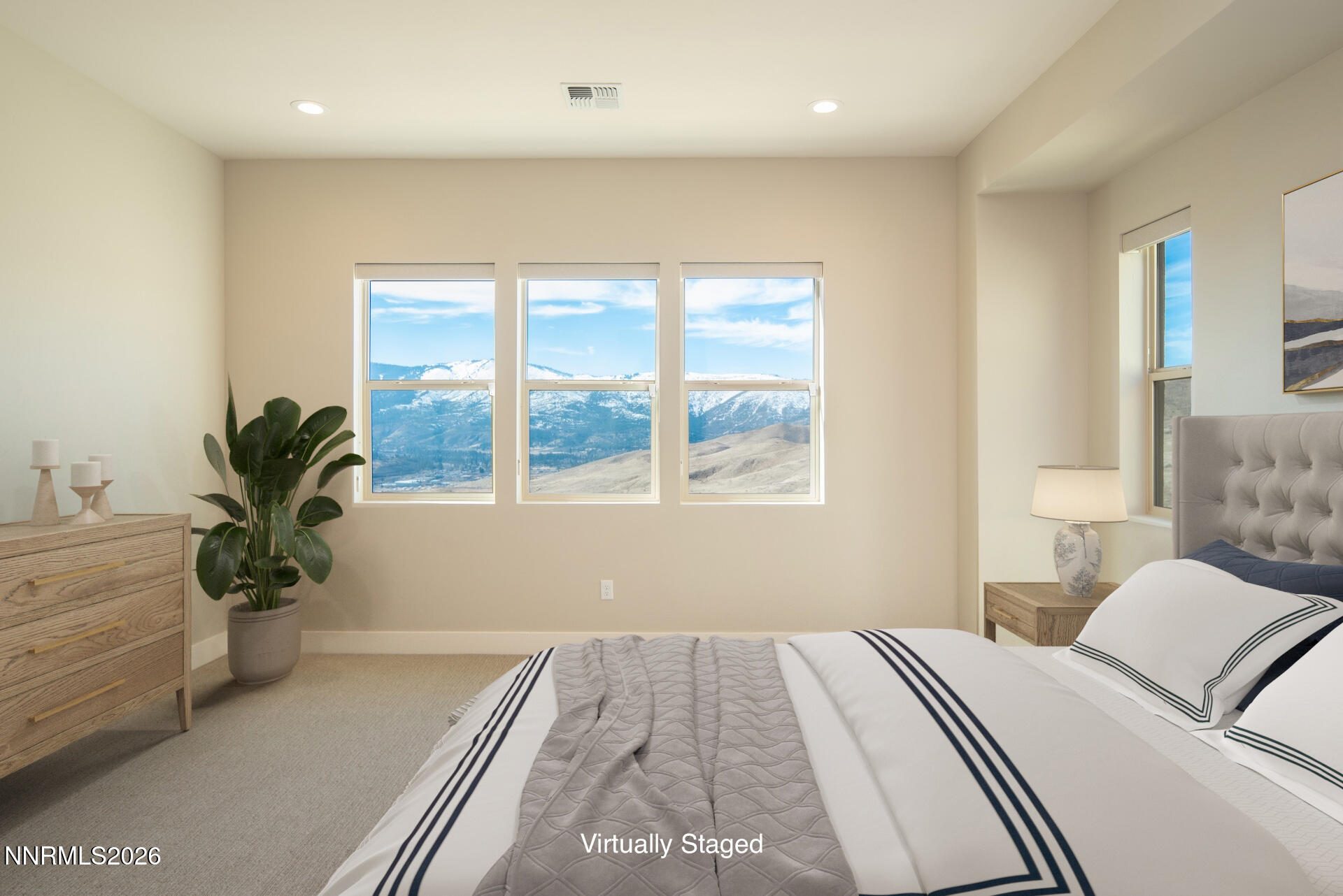 2241 Cold Creek Trail Reno, NV 89523 - Photo 18 of 40 a bedroom with a large bed and a potted plant