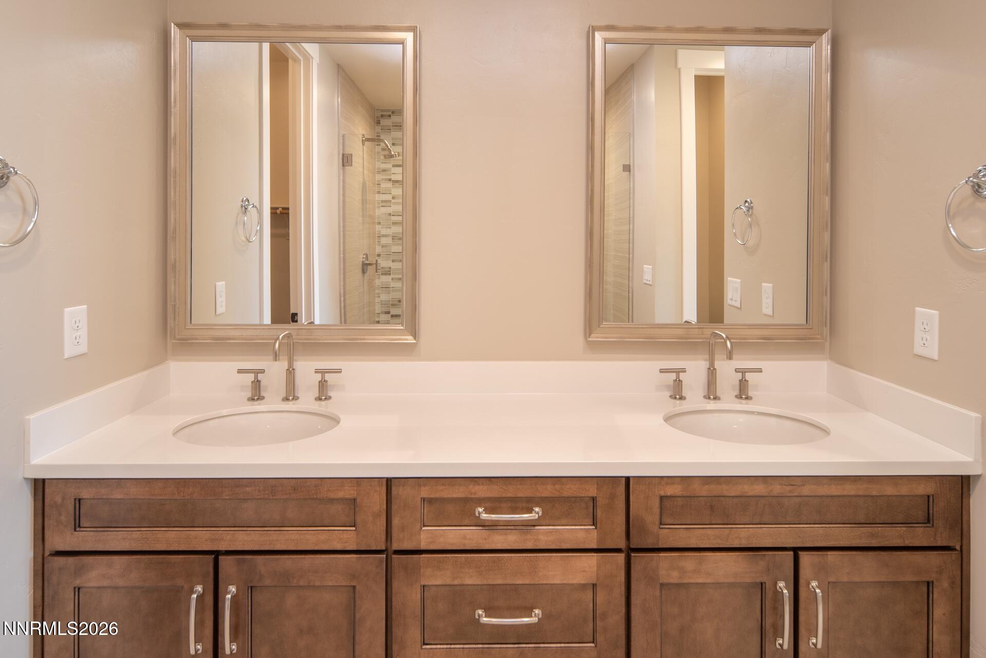 2241 Cold Creek Trail Reno, NV 89523 - Photo 23 of 40 a bathroom with a sink and a mirror
