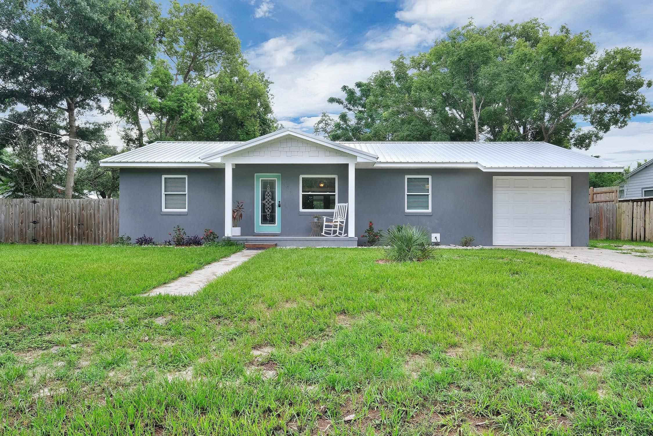141 Argonaut Road St. Augustine, FL 32086 - Photo 1 of 27 a front view of house with yard and green space