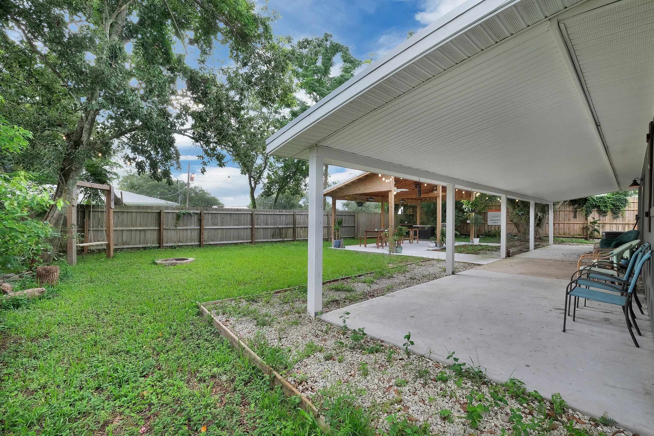 141 Argonaut Road St. Augustine, FL 32086 - Photo 24 of 27 a view of a house with backyard and porch