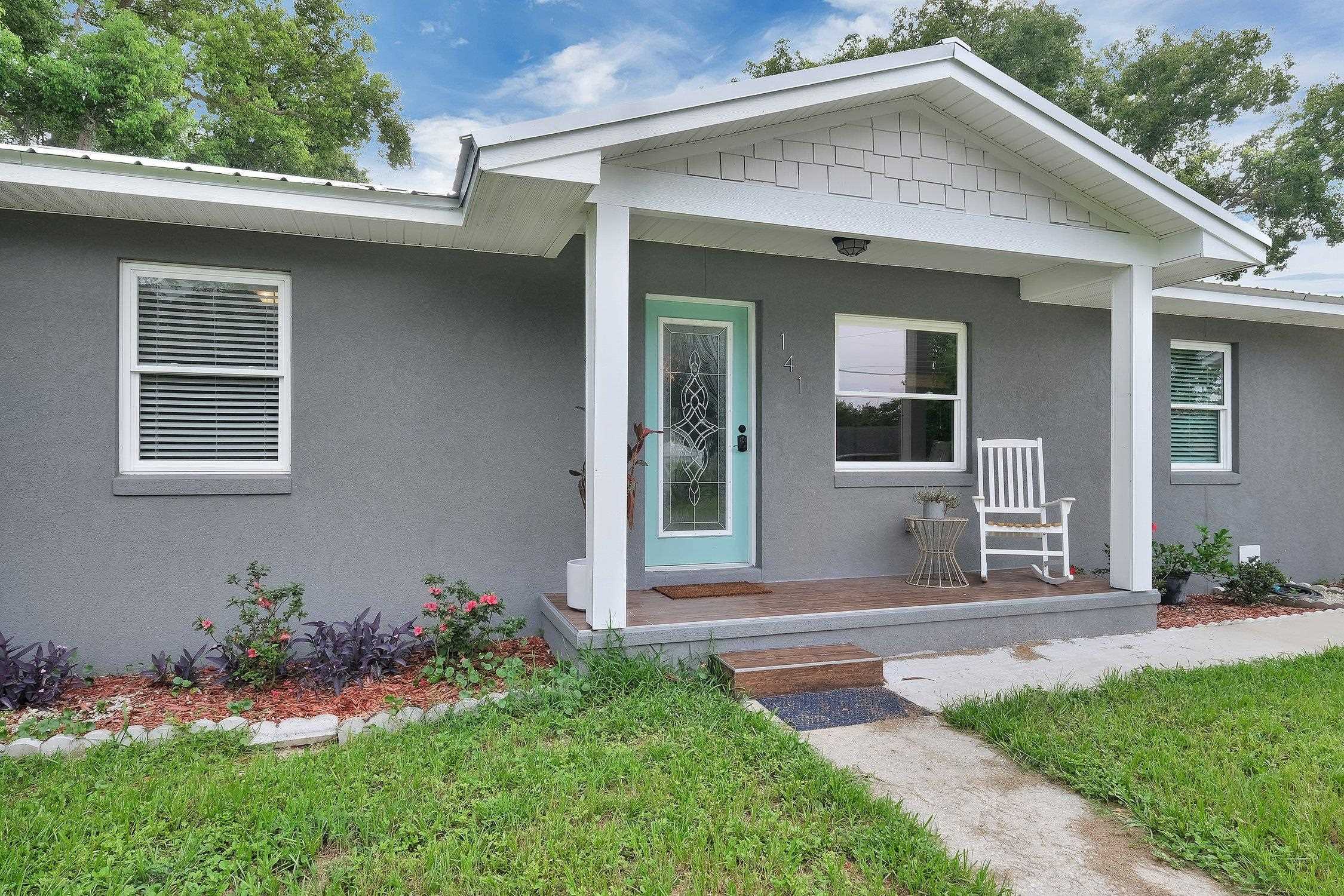 141 Argonaut Road St. Augustine, FL 32086 - Photo 4 of 27 a front view of a house with a yard