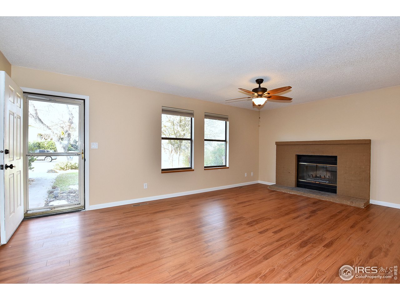 1402 Wildwood Road Fort Collins, CO 80521 - Photo 6 of 26 Living room fireplace to keep you toasty!