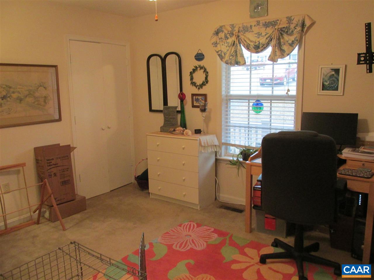 688 Carnation Road Ruckersville, VA 22968 - Photo 15 of 25 a view of a workspace with furniture and a window