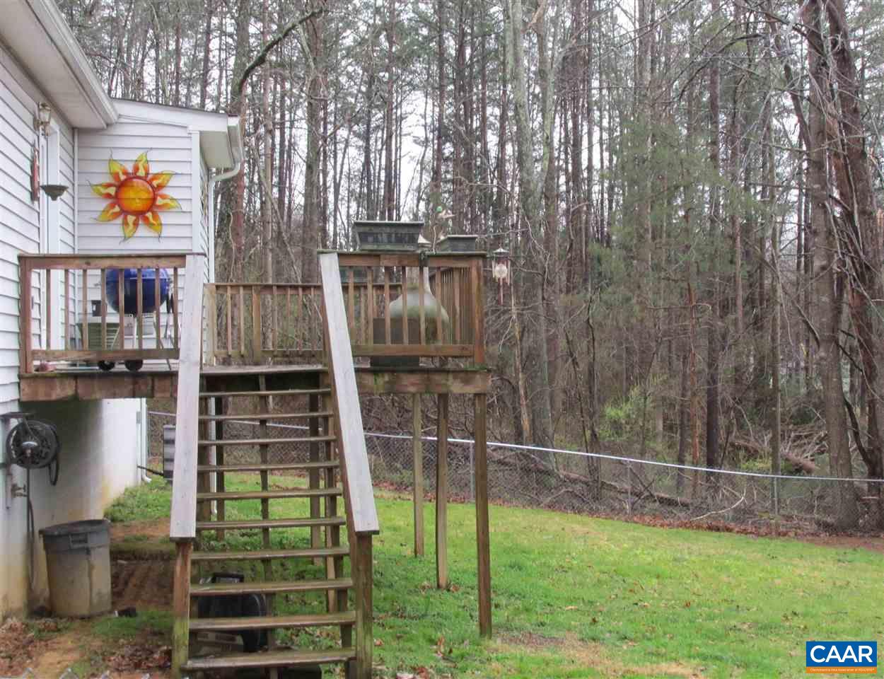 688 Carnation Road Ruckersville, VA 22968 - Photo 22 of 25 a backyard of a house with barbeque oven