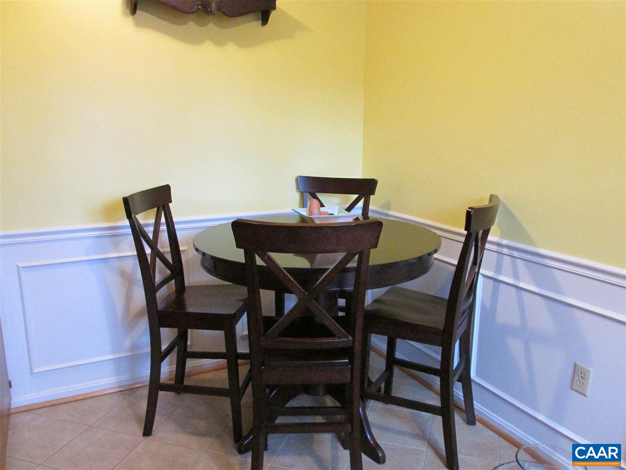 688 Carnation Road Ruckersville, VA 22968 - Photo 4 of 25 a view of a table and chairs in patio