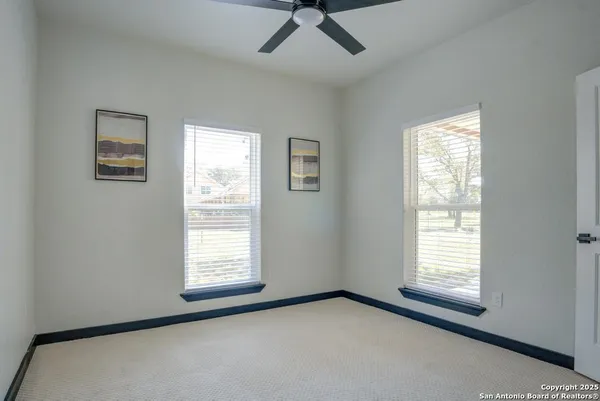 a view of a room that has a window in it