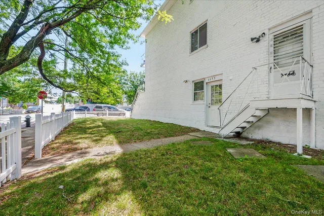 a front view of a house with parking