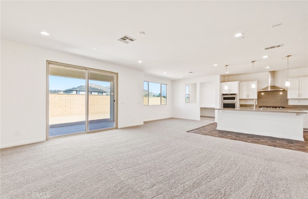 784 Sawgrass Street Perris, CA 92571 - Photo 18 of 46 a view of an empty room with a window