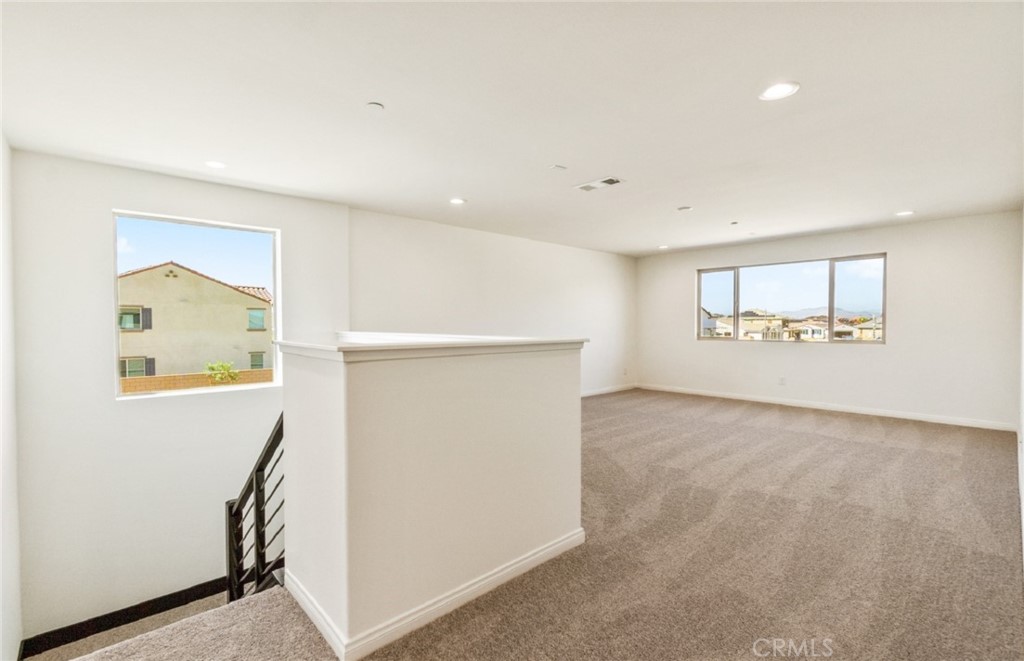 784 Sawgrass Street Perris, CA 92571 - Photo 27 of 46 a view of an empty room