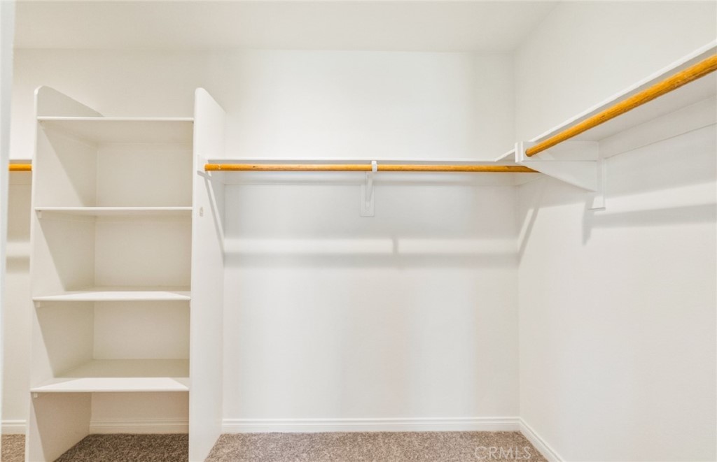 784 Sawgrass Street Perris, CA 92571 - Photo 36 of 46 a close up view of racks on the wall