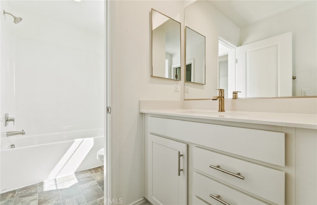 784 Sawgrass Street Perris, CA 92571 - Photo 38 of 46 a bathroom with a sink and a bathtub