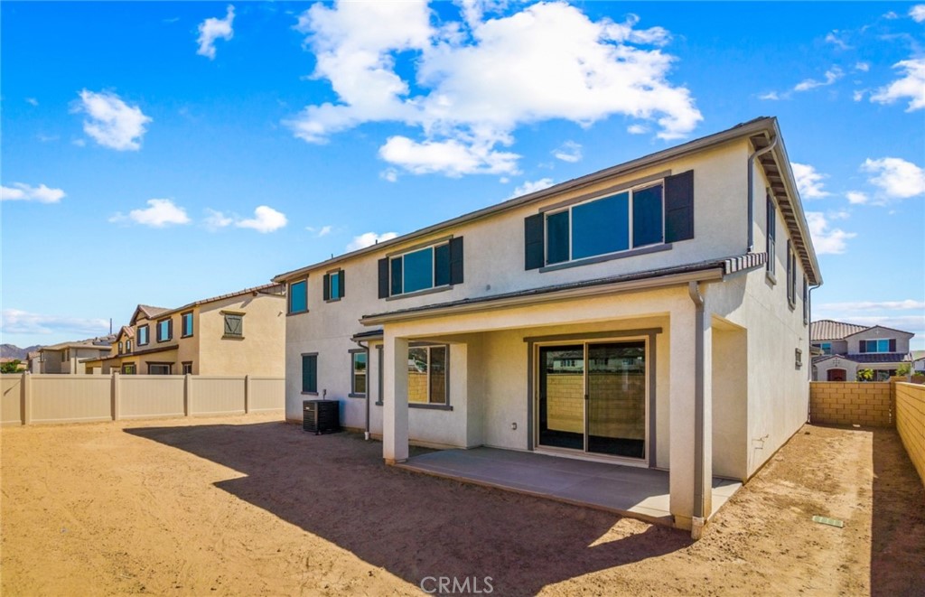 784 Sawgrass Street Perris, CA 92571 - Photo 5 of 46 a front view of a house with a yard