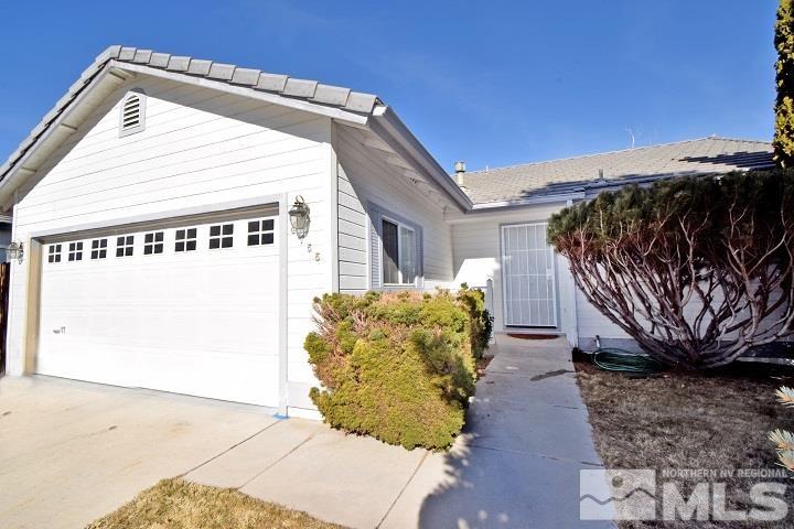 4755 Goodwin Road Sparks, NV 89436 - Photo 1 of 38 a view of a house with a door and wooden fence