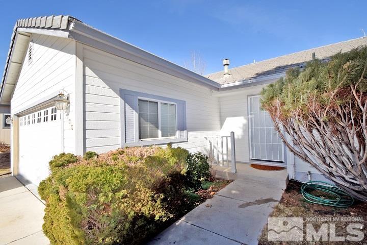 4755 Goodwin Road Sparks, NV 89436 - Photo 2 of 38 a front view of a house with a yard