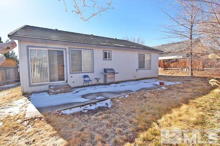 4755 Goodwin Road Sparks, NV 89436 - Photo 27 of 38 a view of a house with backyard and sitting area
