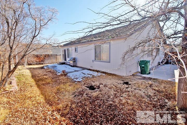 4755 Goodwin Road Sparks, NV 89436 - Photo 29 of 38 a view of a yard with a large tree