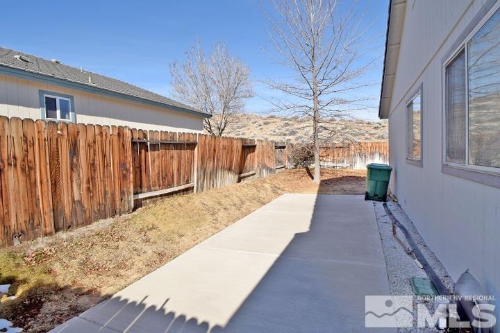 4755 Goodwin Road Sparks, NV 89436 - Photo 32 of 38 a view of a backyard with a patio