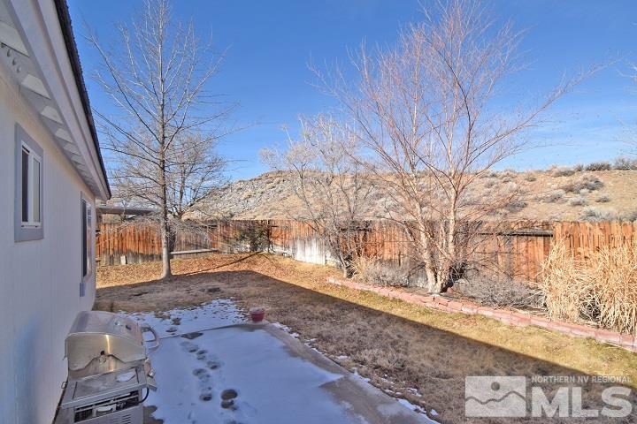 4755 Goodwin Road Sparks, NV 89436 - Photo 36 of 38 a view of a backyard of the house