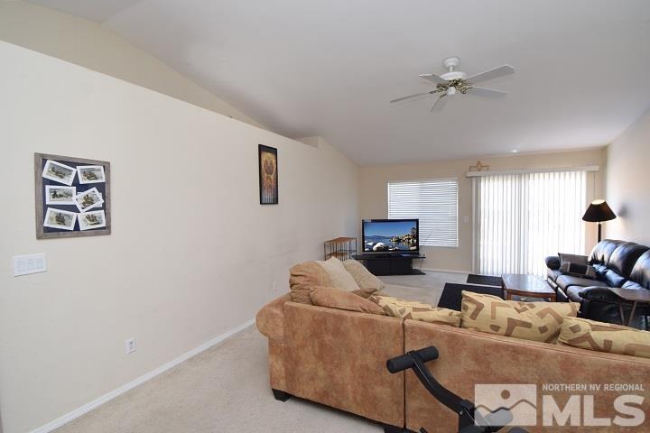 4755 Goodwin Road Sparks, NV 89436 - Photo 8 of 38 a living room with furniture and a window
