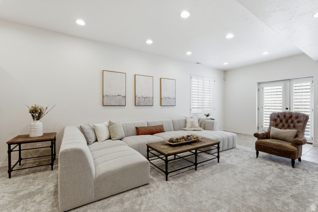 1712 Somerset Ridge Drive Draper, UT 84020 - Photo 56 of 76 Recessed lighting illuminating a spacious room with light-toned wall finishes and plush carpeting