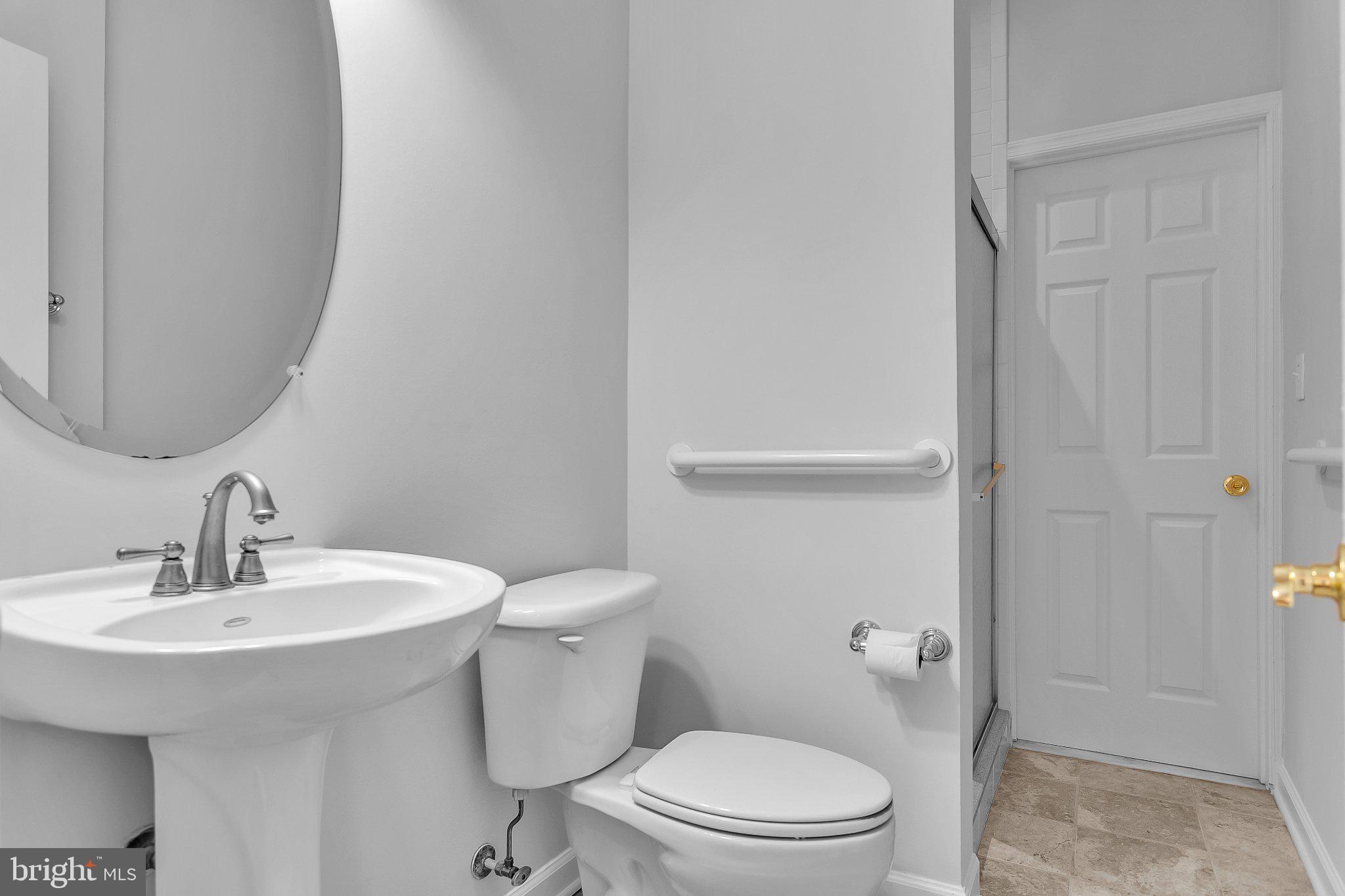 22855 Oakgrove Road Sterling, VA 20166 - Photo 9 of 15 Main level toilet