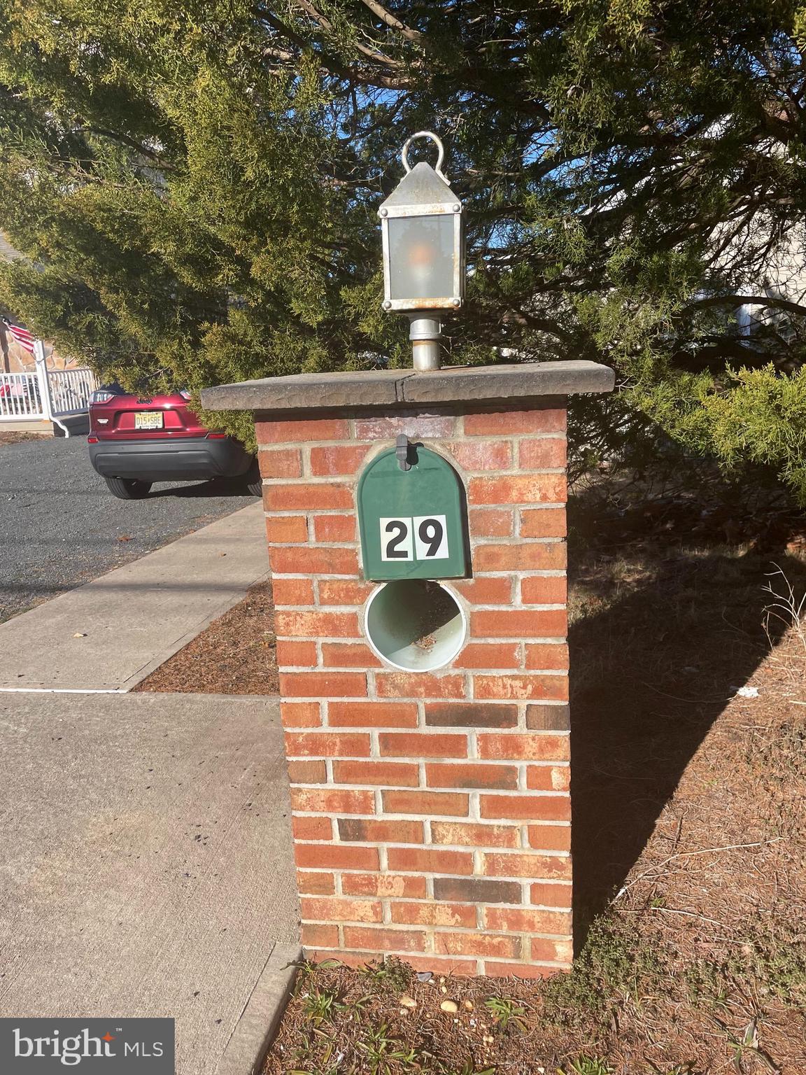 29 Dock Avenue Waretown, NJ 08758 - Photo 1 of 21 a front view of a building with parking space