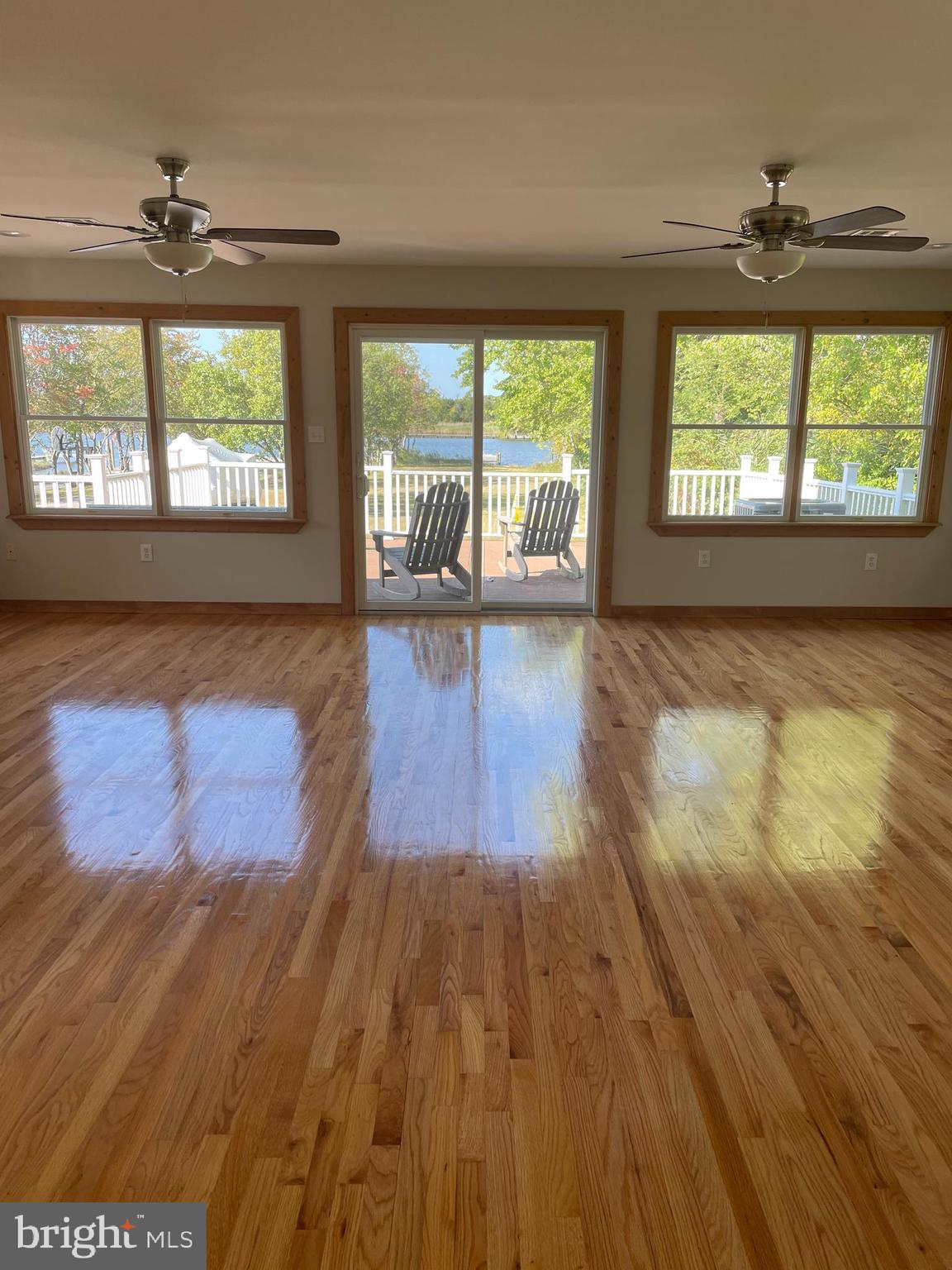 29 Dock Avenue Waretown, NJ 08758 - Photo 15 of 21 wooden floor in an empty room with a window
