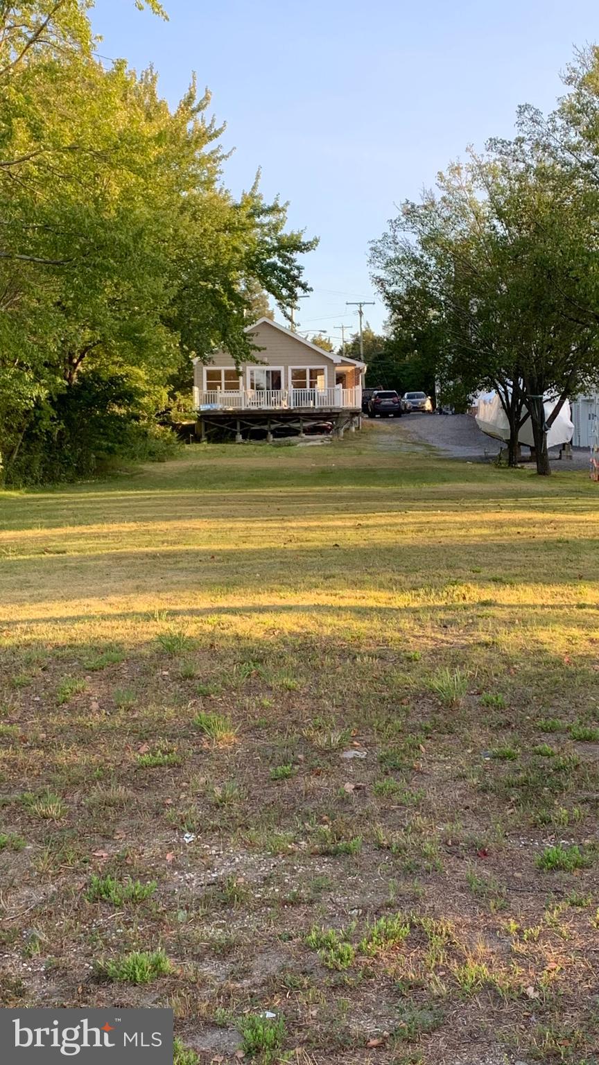 29 Dock Avenue Waretown, NJ 08758 - Photo 18 of 21 a view of a swimming pool with an ocean view