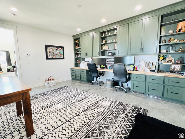 100 Whit Lane Georgetown, ID 83239 - Photo 22 of 76 Home office with built in study area, built in features, recessed lighting, and concrete floors