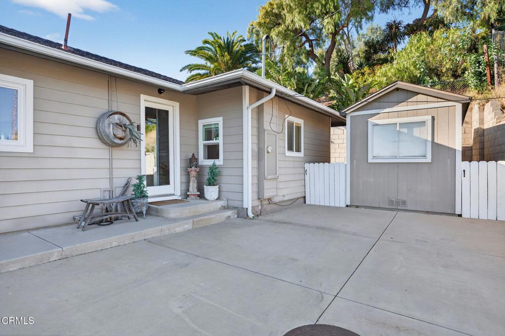 559 North Loop Drive Camarillo, CA 93010 - Photo 23 of 76 a view of a house with a patio and a yard