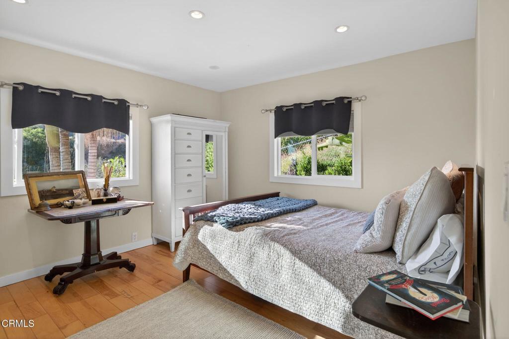 559 North Loop Drive Camarillo, CA 93010 - Photo 35 of 76 a bedroom with a bed and a desk