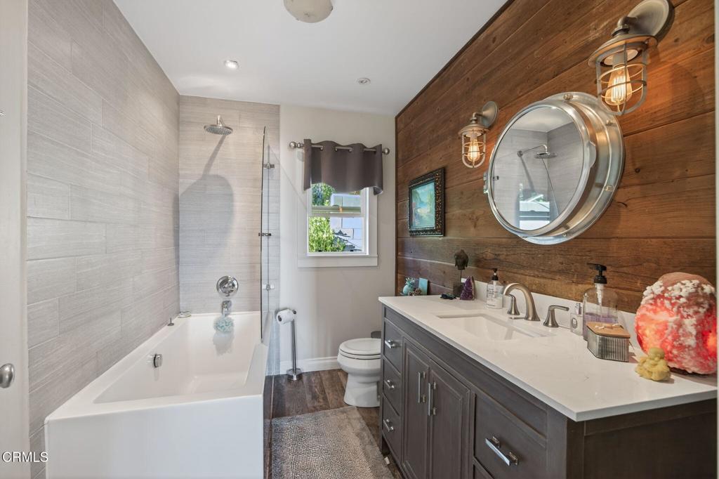 559 North Loop Drive Camarillo, CA 93010 - Photo 37 of 76 a bathroom with a sink and a mirror