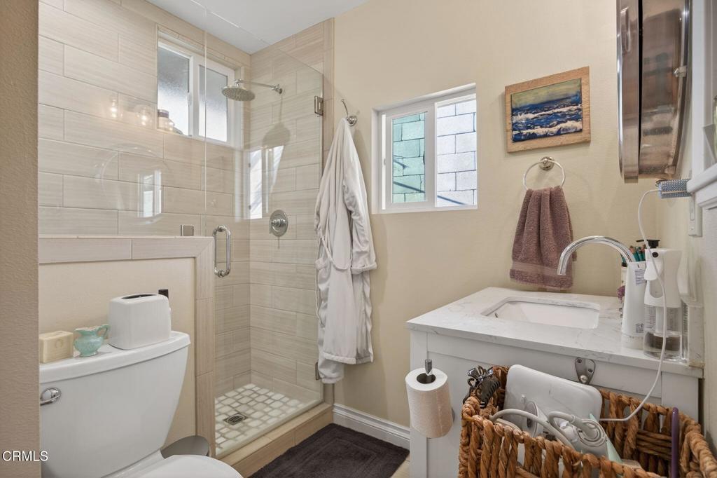 559 North Loop Drive Camarillo, CA 93010 - Photo 42 of 76 a bathroom with a sink a toilet and shower
