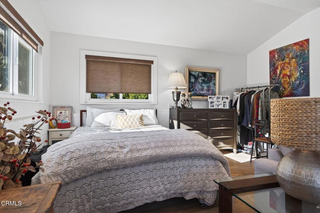 559 North Loop Drive Camarillo, CA 93010 - Photo 48 of 76 a bedroom with a bed and a couch